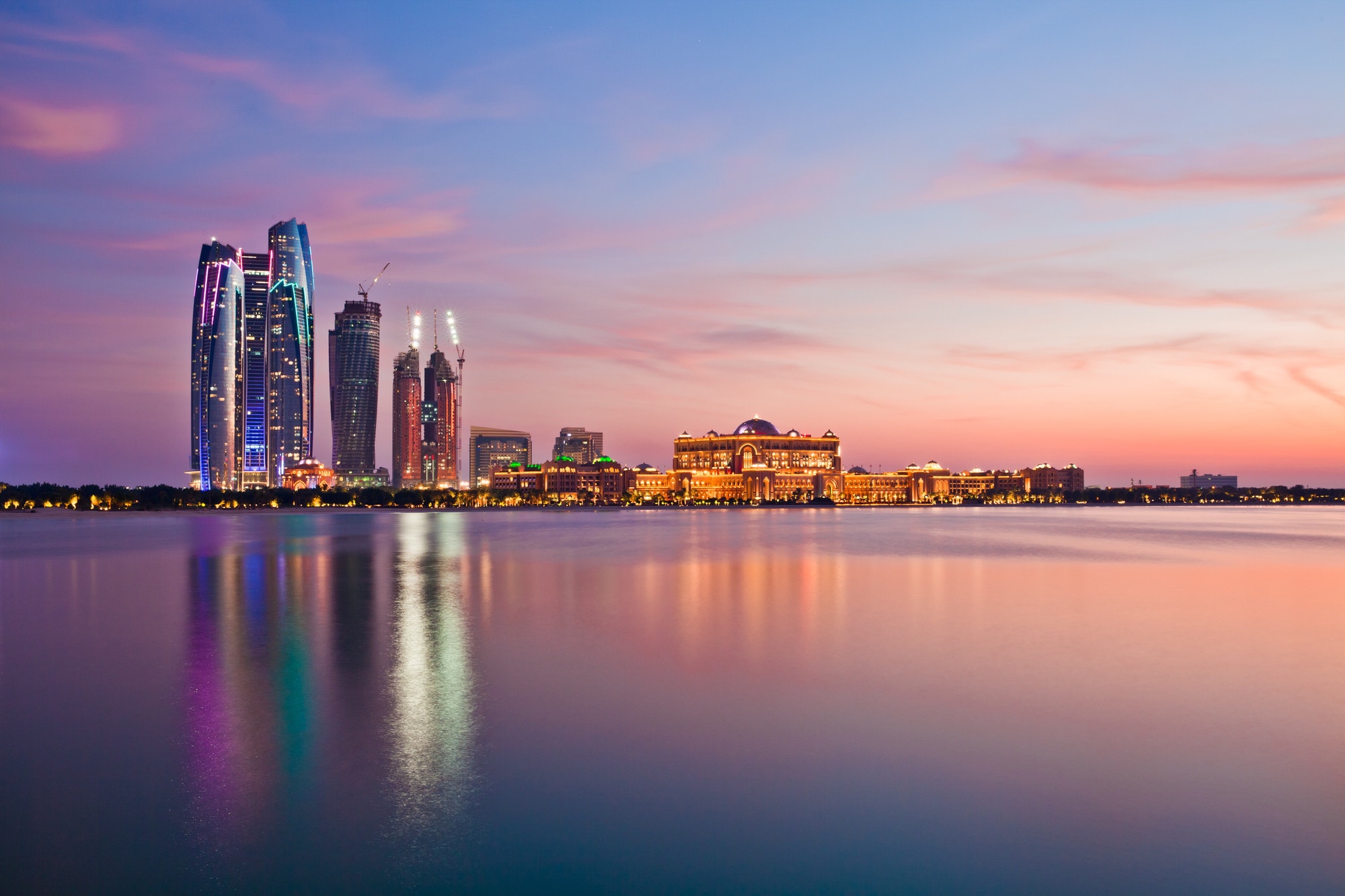 Abu Dhabi cityscape at dusk, travel destination
